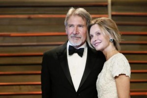 Actor Harrison Ford and his wife Calista Flockhart arrive at the 2014 Vanity Fair Oscars Party in West Hollywood, California March 2, 2014. CREDIT: REUTERS/DANNY MOLOSHOK